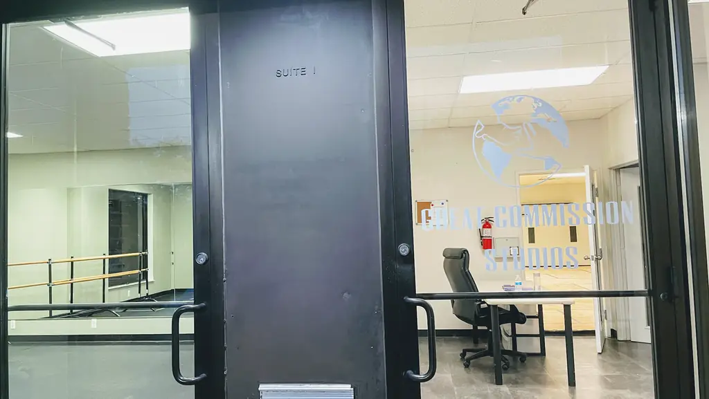 The studio suite entrance with the Great Commission Studios window decal